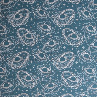 Saturno sobre galaxia azul Saturno sobre galaxia azul